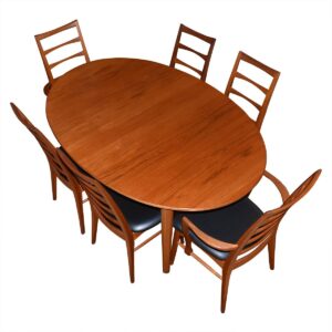 John Stuart Danish Modern Teak Expanding Oval Dining Table.