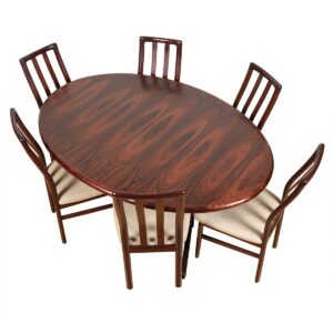 Danish Modern Rosewood Oval Expanding Pedestal Dining Table.