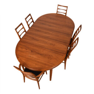 Danish Modern Teak Expanding Round-to-Oval Dining Table.