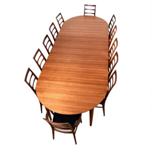 4 Leaves Seats 12 — Round-to-Oval Danish Modern Teak Expanding Dining Table